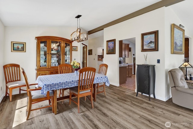 2610 E Section St Unit 25, Mount Vernon, WA 98274 - dining space featuring light wood finished floors and a chandelier