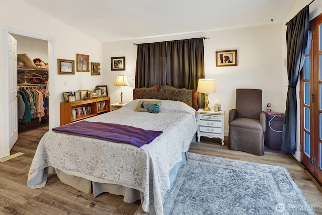 2610 E Section St Unit 25, Mount Vernon, WA 98274 - bedroom with wood finished floors, a spacious closet, and a closet