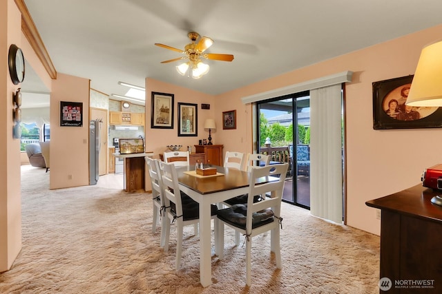 1427 100th St SW Unit 160, Everett, WA 98204 - dining room with light carpet, a ceiling fan, and lofted ceiling
