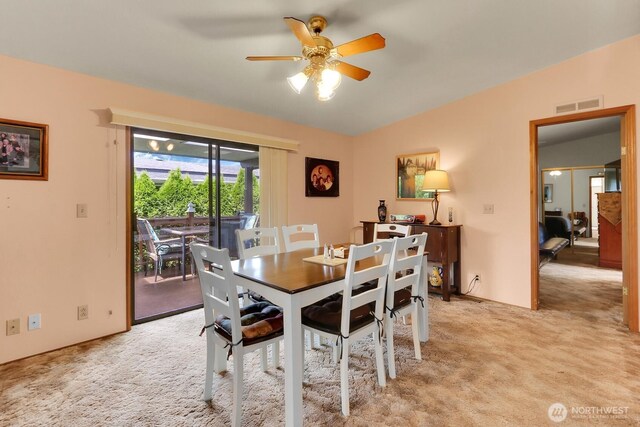 1427 100th St SW Unit 160, Everett, WA 98204 - dining space featuring light carpet, ceiling fan, and vaulted ceiling