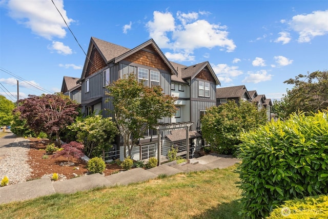 4252 Williams Ave W, Seattle, WA 98199 - view of home's exterior with board and batten siding and a shingled roof