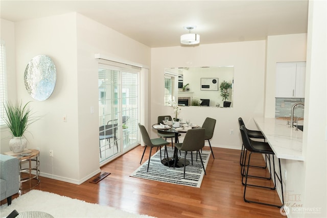 18630 NE 57th Way, Redmond, WA 98052 - dining room featuring wood finished floors and baseboards