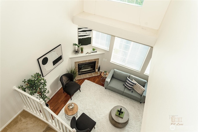 18630 NE 57th Way, Redmond, WA 98052 - living area featuring a tile fireplace and baseboards