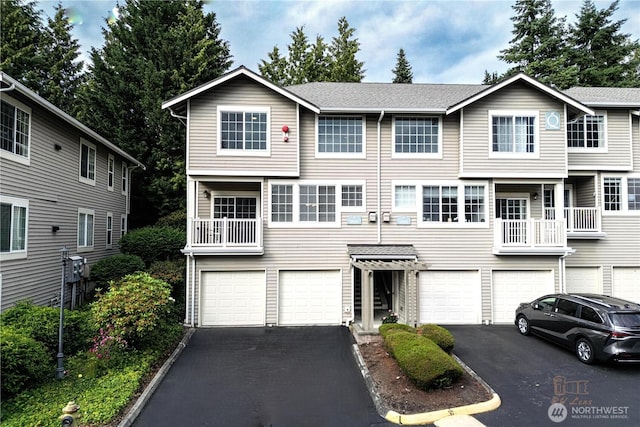 18630 NE 57th Way, Redmond, WA 98052 - view of property with a garage and driveway