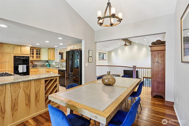 7622 130th Ave NE, Kirkland, WA 98033 - dining room featuring lofted ceiling, dark wood finished floors, recessed lighting, and a chandelier