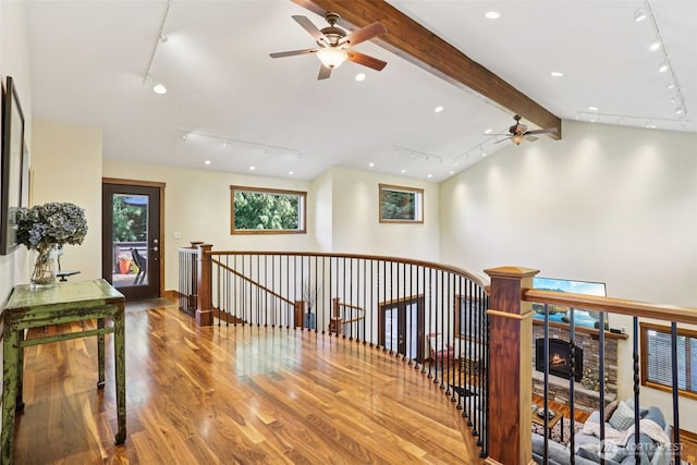 7622 130th Ave NE, Kirkland, WA 98033 - hall featuring track lighting, an upstairs landing, and wood finished floors