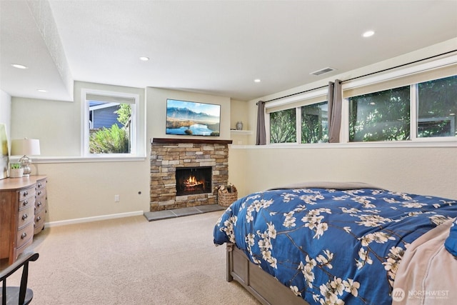 7622 130th Ave NE, Kirkland, WA 98033 - bedroom featuring carpet flooring, a stone fireplace, and recessed lighting