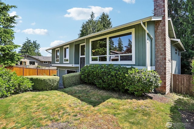 7622 130th Ave NE, Kirkland, WA 98033 - view of front facade with a chimney and board and batten siding