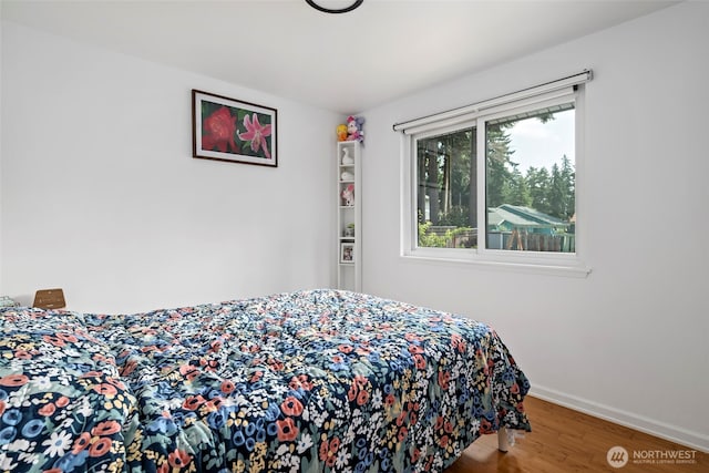 538 NW Ensign Dr, Oak Harbor, WA 98277 - bedroom with wood finished floors and baseboards