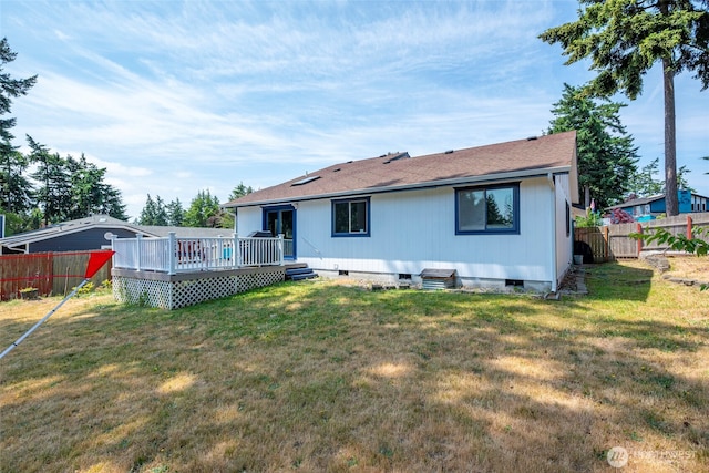 538 NW Ensign Dr, Oak Harbor, WA 98277 - back of house featuring crawl space, a deck, a fenced backyard, and roof with shingles