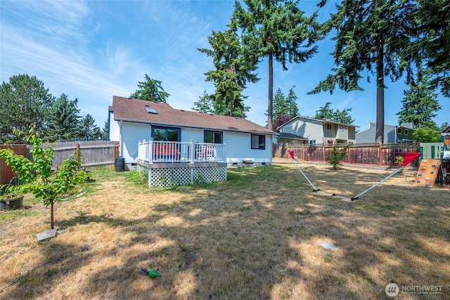 538 NW Ensign Dr, Oak Harbor, WA 98277 - back of property with a deck and a fenced backyard