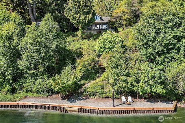 14830 Glen Acres Rd SW, Vashon, WA 98070 - view of subject property with a nearby body of water and a heavily wooded area