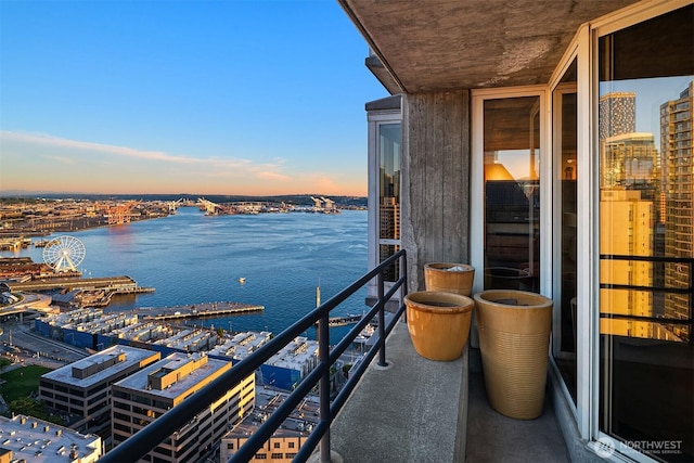 2125 1st Ave Unit 3003, Seattle, WA 98121 - balcony at dusk with a water view