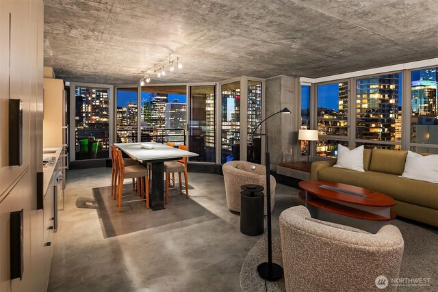 2125 1st Ave Unit 3003, Seattle, WA 98121 - dining space featuring concrete flooring, a view of city, and a dry bar