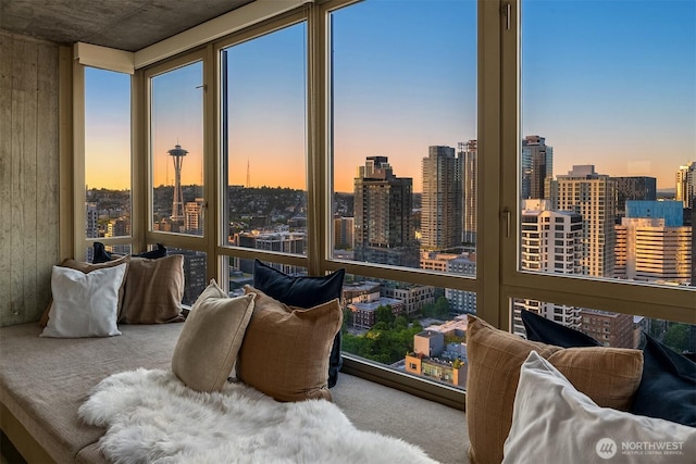 2125 1st Ave Unit 3003, Seattle, WA 98121 - sunroom with carpet floors and a skyline view