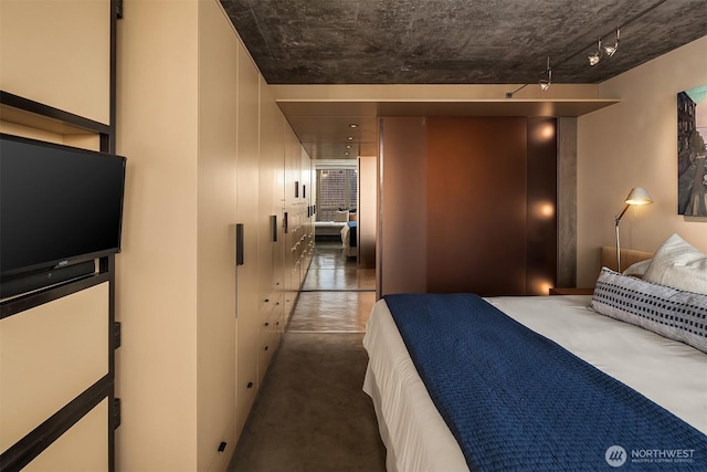 2125 1st Ave Unit 3003, Seattle, WA 98121 - bedroom with concrete flooring