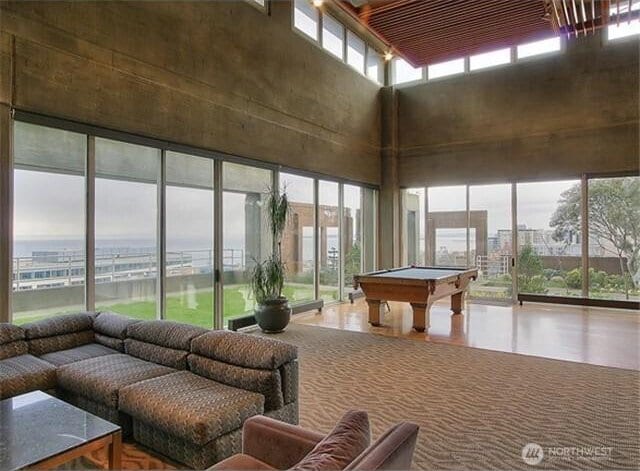 2125 1st Ave Unit 3003, Seattle, WA 98121 - rec room featuring a towering ceiling, billiards, and tile patterned floors