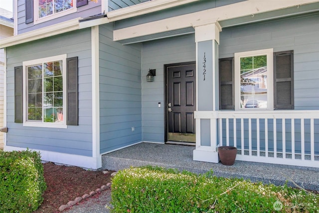 13421 Elk Ridge Rd SE, Monroe, WA 98272 - doorway to property with a porch