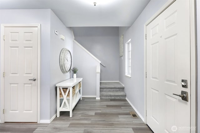 13421 Elk Ridge Rd SE, Monroe, WA 98272 - foyer featuring stairway and wood finished floors