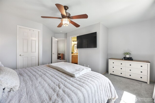13421 Elk Ridge Rd SE, Monroe, WA 98272 - bedroom featuring light carpet, ceiling fan, and connected bathroom