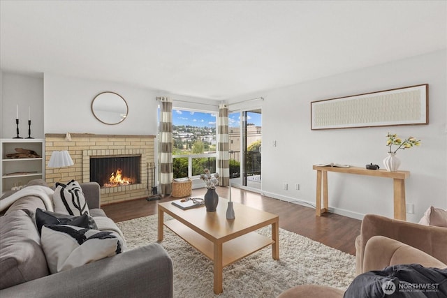 2636 22nd Ave W Unit 101, Seattle, WA 98199 - living area with a fireplace and wood finished floors