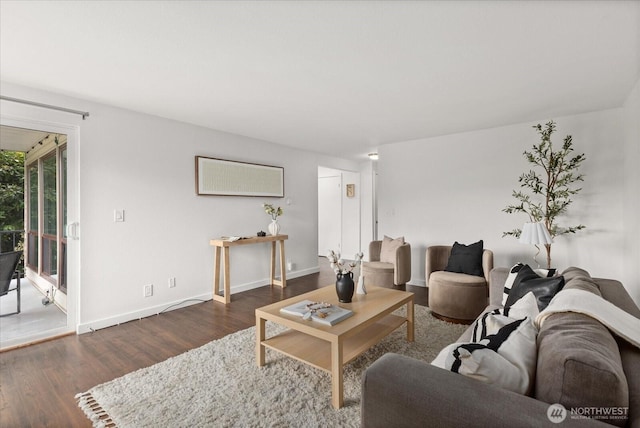 2636 22nd Ave W Unit 101, Seattle, WA 98199 - living area featuring wood finished floors and baseboards