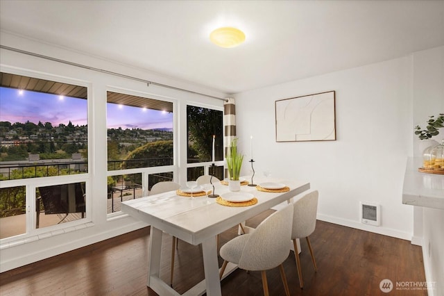 2636 22nd Ave W Unit 101, Seattle, WA 98199 - dining area featuring dark wood-style floors