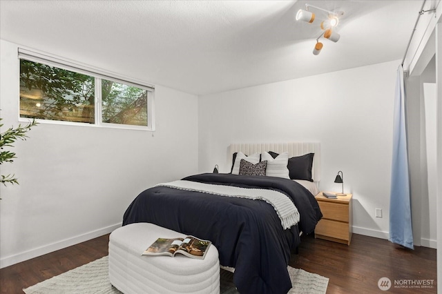 2636 22nd Ave W Unit 101, Seattle, WA 98199 - bedroom featuring wood finished floors and baseboards