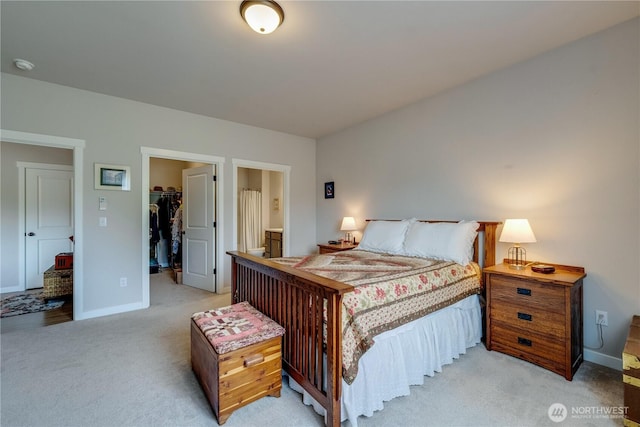 103N Trail Rd, Sedro Woolley, WA 98284 - bedroom featuring light colored carpet, a spacious closet, connected bathroom, and a closet