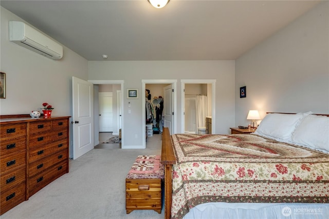 103N Trail Rd, Sedro Woolley, WA 98284 - bedroom with an AC wall unit, light carpet, a walk in closet, ensuite bathroom, and a closet
