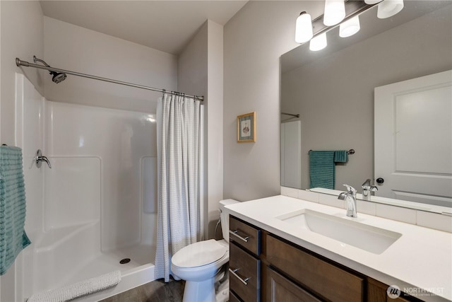 103N Trail Rd, Sedro Woolley, WA 98284 - full bath with vanity, a shower with shower curtain, and wood finished floors
