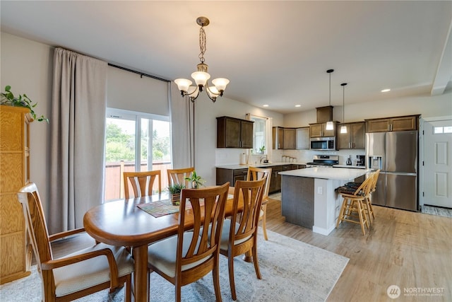 103N Trail Rd, Sedro Woolley, WA 98284 - dining space featuring healthy amount of natural light, light wood-style floors, a chandelier, and recessed lighting