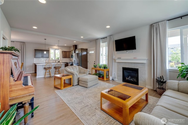 103N Trail Rd, Sedro Woolley, WA 98284 - living room featuring recessed lighting, light wood finished floors, and a tile fireplace