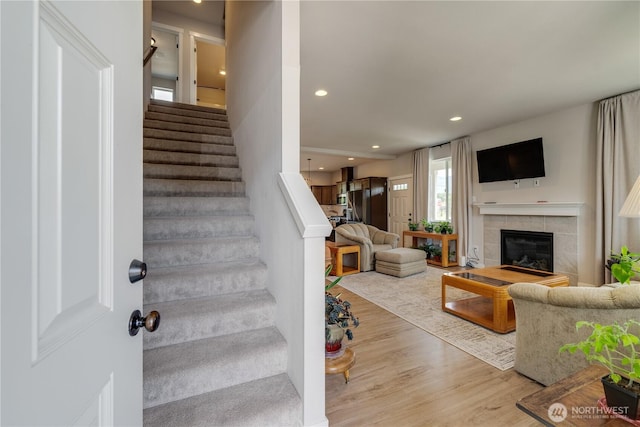 103N Trail Rd, Sedro Woolley, WA 98284 - stairway with wood finished floors, a fireplace, and recessed lighting
