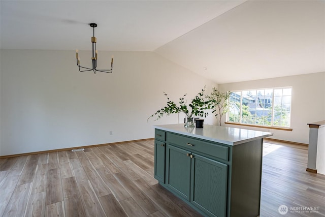 7801 144th Street Ct E, Puyallup, WA 98375 - unfurnished dining area featuring a chandelier, light wood-type flooring, and lofted ceiling