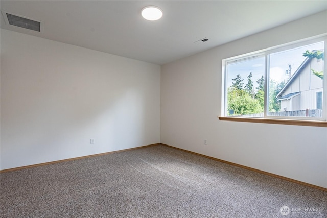 7801 144th Street Ct E, Puyallup, WA 98375 - carpeted spare room featuring baseboards