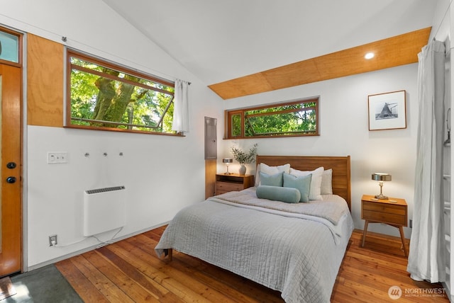 11230 Asta Ln SW, Vashon, WA 98070 - bedroom featuring vaulted ceiling and hardwood / wood-style flooring