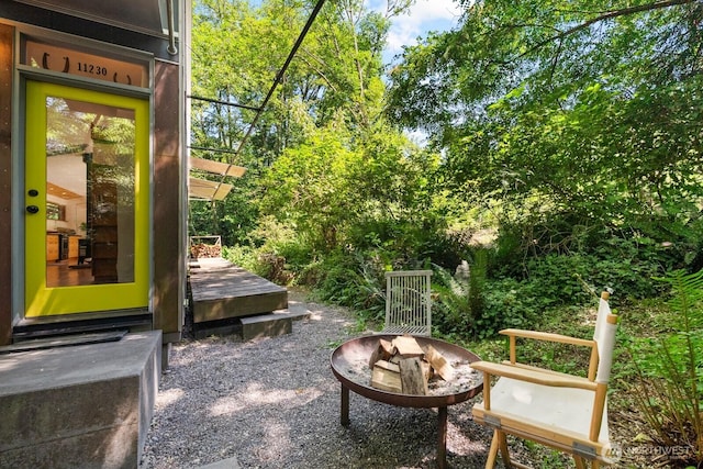 11230 Asta Ln SW, Vashon, WA 98070 - view of yard with an outdoor fire pit
