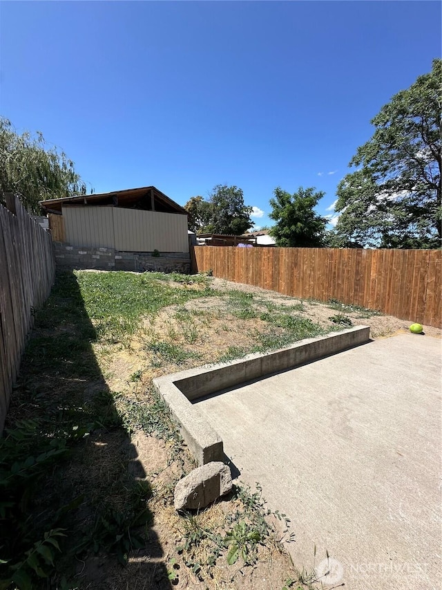 836 S Cashmere St, Wenatchee, WA 98801 - fenced backyard featuring a patio