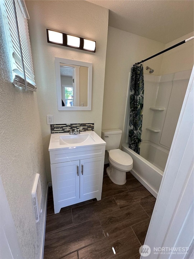 836 S Cashmere St, Wenatchee, WA 98801 - full bathroom with a textured wall, vanity, wood finish floors, and shower / bath combo