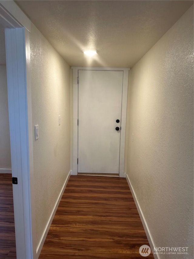 836 S Cashmere St, Wenatchee, WA 98801 - hall featuring a textured wall, dark wood-style floors, and a textured ceiling