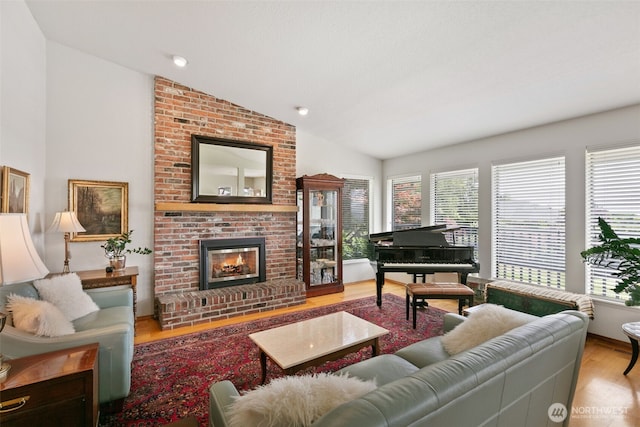 7610 Scenic Dr, Yakima, WA 98908 - living room featuring lofted ceiling, wood finished floors, a fireplace, and recessed lighting