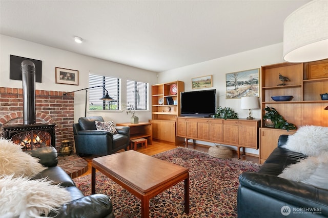 7610 Scenic Dr, Yakima, WA 98908 - living area with a wood stove and light wood finished floors