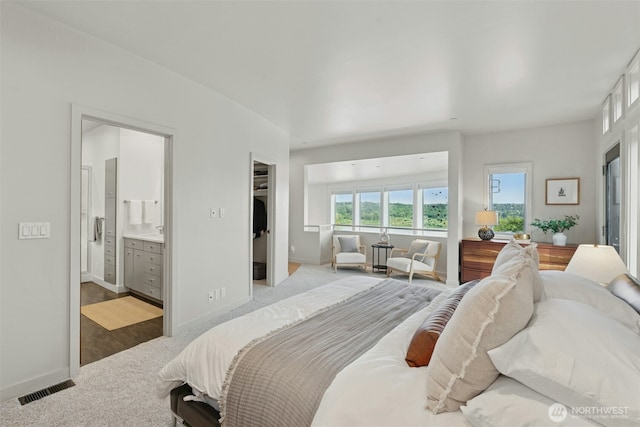 8812 NE 117th Pl, Kirkland, WA 98034 - bedroom with ensuite bathroom and a walk in closet