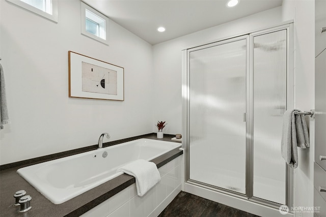 8812 NE 117th Pl, Kirkland, WA 98034 - bathroom featuring a garden tub, a stall shower, recessed lighting, and wood finished floors