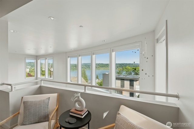8812 NE 117th Pl, Kirkland, WA 98034 - sitting room featuring a water view and recessed lighting