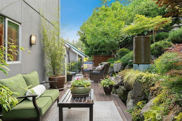 8812 NE 117th Pl, Kirkland, WA 98034 - wooden terrace featuring outdoor lounge area and a patio area
