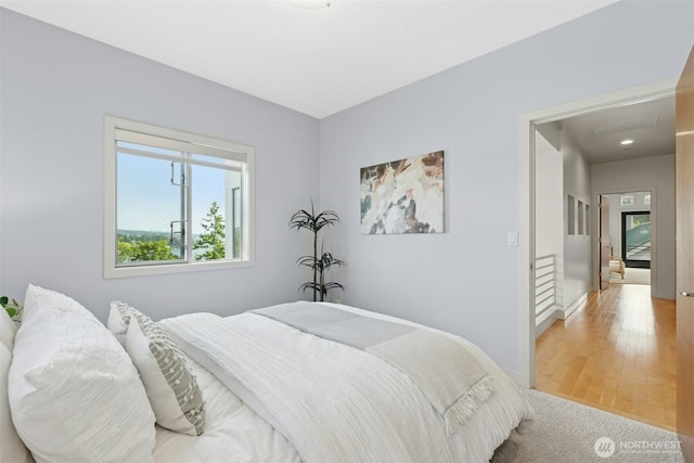8812 NE 117th Pl, Kirkland, WA 98034 - bedroom with light wood-type flooring and baseboards