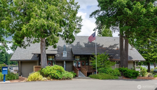 110 E Shannon Pl, Shelton, WA 98584 - view of front of property featuring a shingled roof and stairway