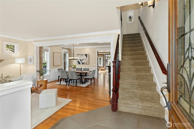 2621 NE Park Dr, Issaquah, WA 98029 - foyer with stairs, ornamental molding, and wood finished floors
